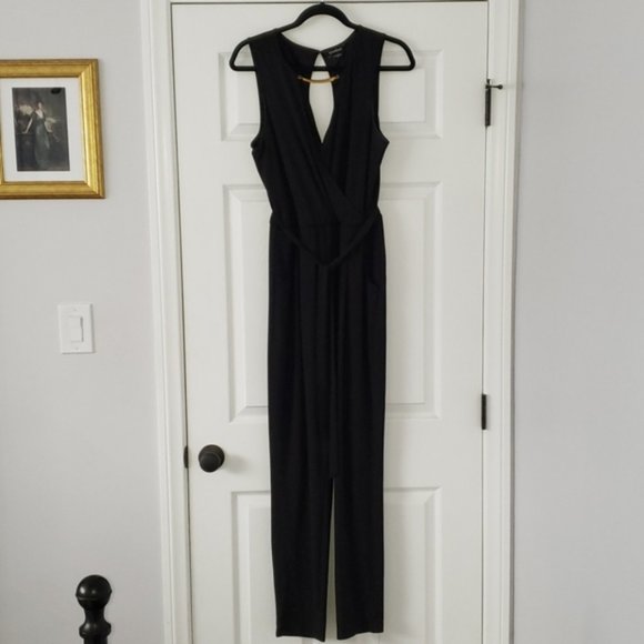 bebe Pants - Very Nice! BeBe black jumpsuit Sz: SP